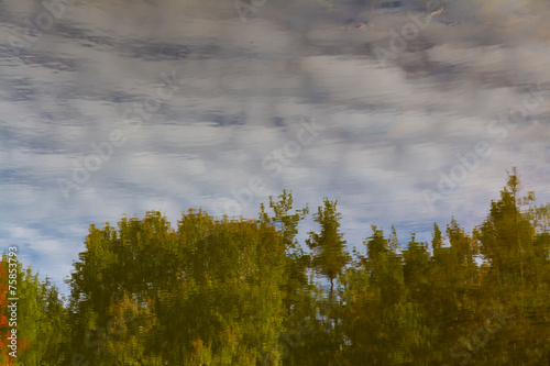 Water reflection of clouds and trees-Czech Rep. © zm_photo