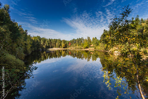 Fototapeta Naklejka Na Ścianę i Meble -  Water reflection of trees and sky - Czech Republic