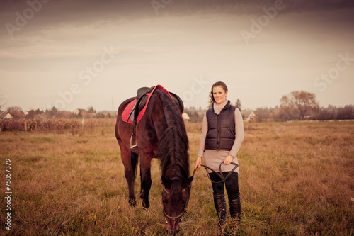 Fototapeta Naklejka Na Ścianę i Meble -  beautiful woman with horse