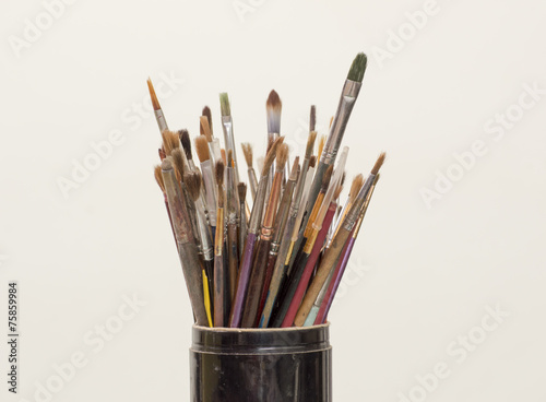 Brushes in black jar as painter's tool