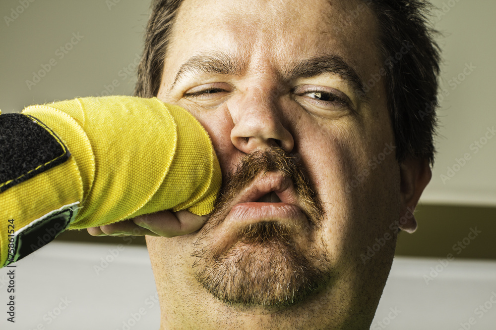 Man Getting Punched Stock Photo | Adobe Stock