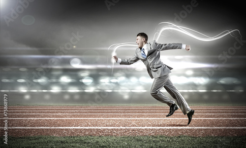Running businessman © Sergey Nivens