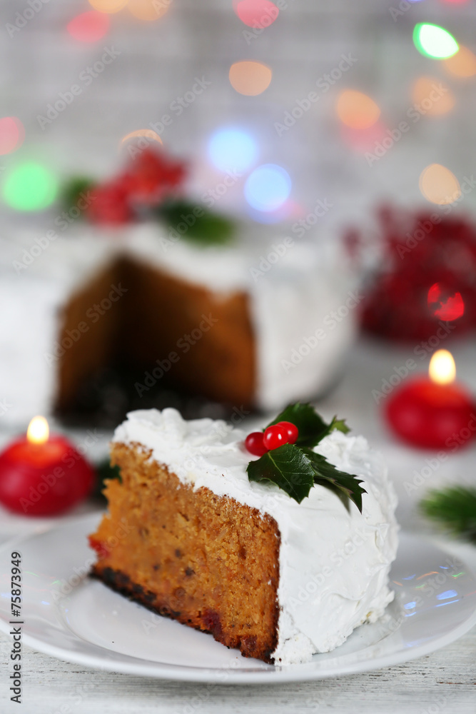 Slice of cake covered cream with Christmas decoration