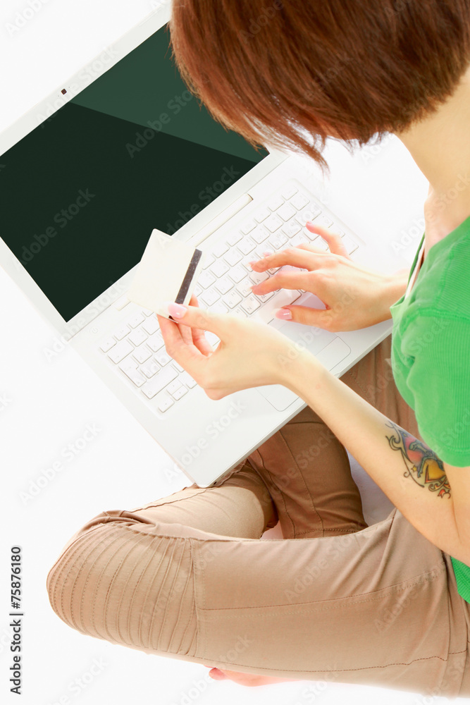 Top view of young woman shopping online isolated on white Top view of young woman shopping online isolated on white
