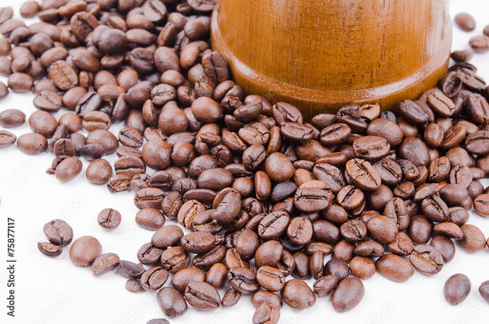Fototapeta premium Vintage manual coffee grinder with coffee beans isolated