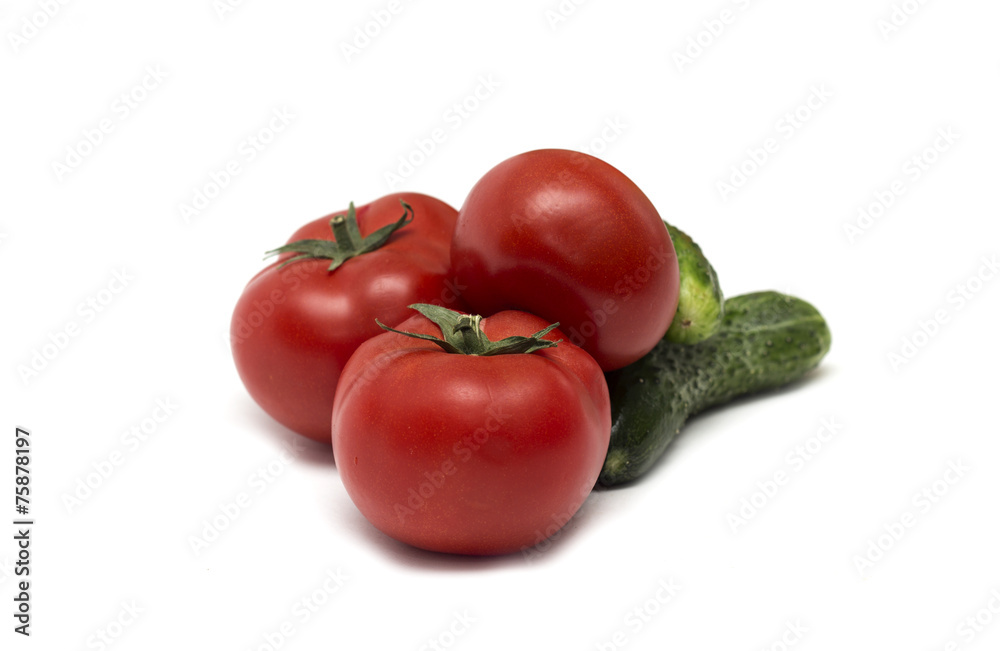 Red tomato and green cucumber. Photo.