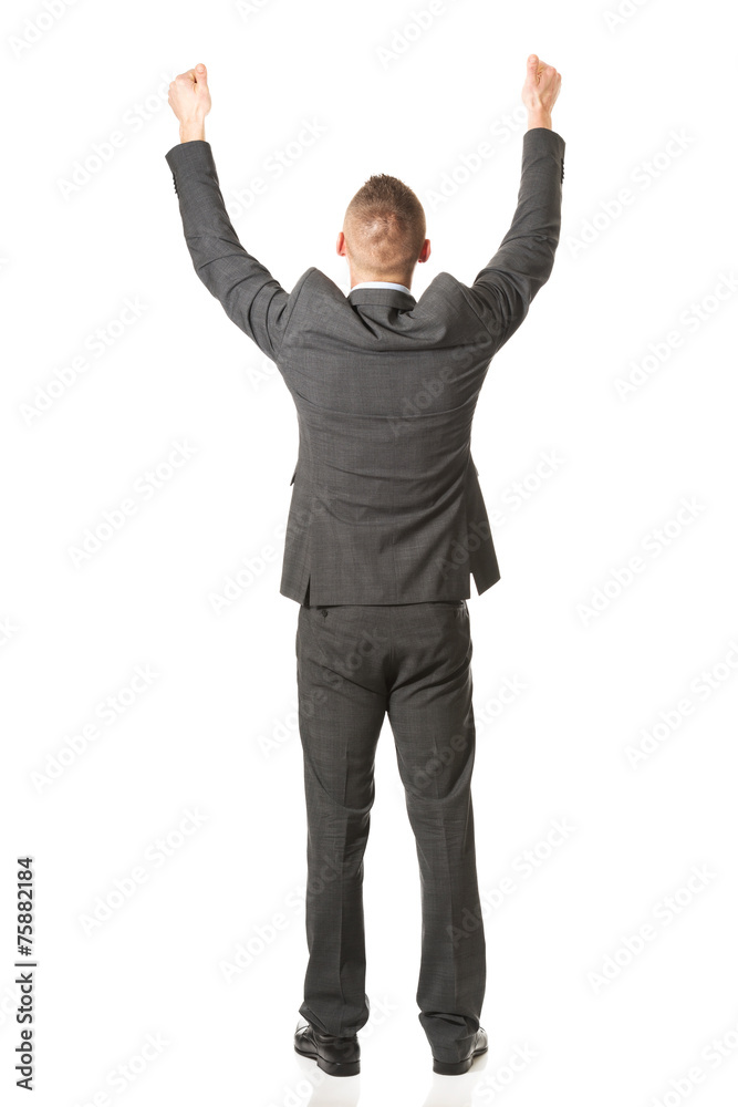 Young businessman celebrating his business success Young businessman celebrating his business success