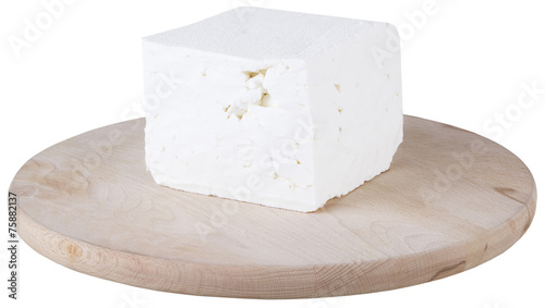 white cheese on wooden board. isolated on white background.