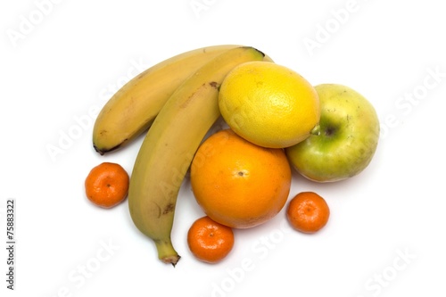 Fruits - banana  apple  orange  lemon and tangerine. Photo.
