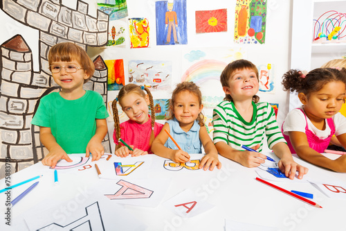 Group of little kids in early development class