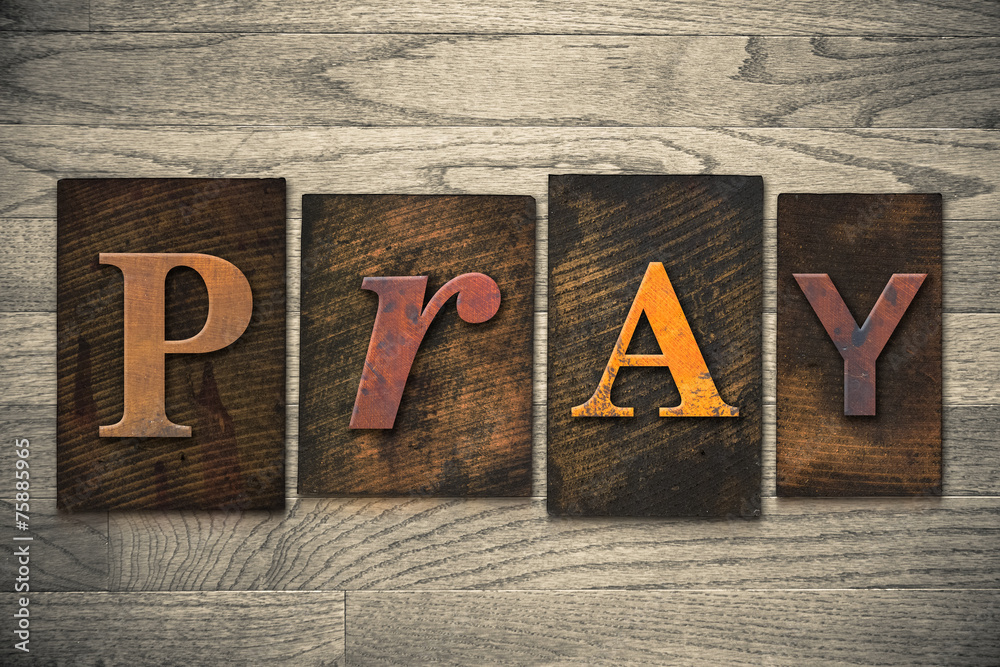 Fototapeta premium Pray Concept Wooden Letterpress Type