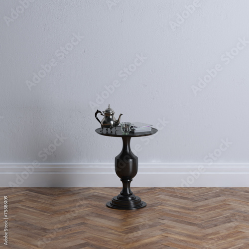 Black wooden coffee table in luxury interior design with parquet