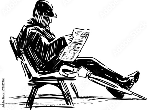 man reading a newspaper