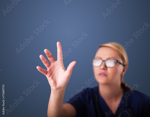 Young female doctor gesturing with copy space