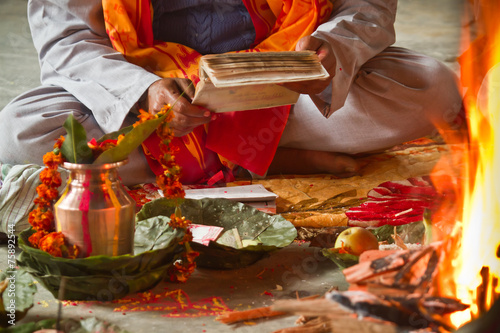 Brahmin reading hindu mantra in Nepal