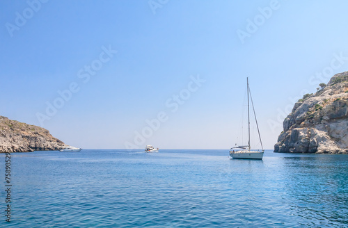 Yacht in the blue sea. Rhodes Island. Greece