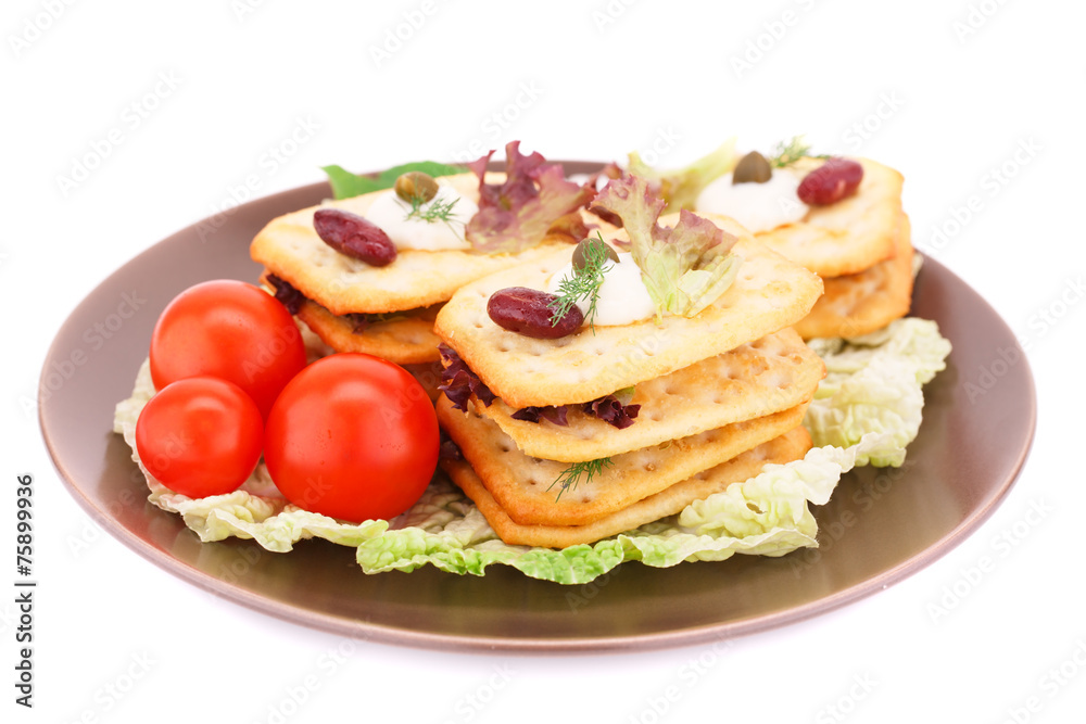 Crackers with fresh vegetables and cream Crackers with fresh vegetables and cream