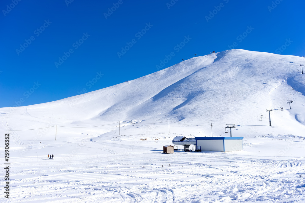 Obraz premium Aerial View of snowed mountain Falakro, in Greece.
