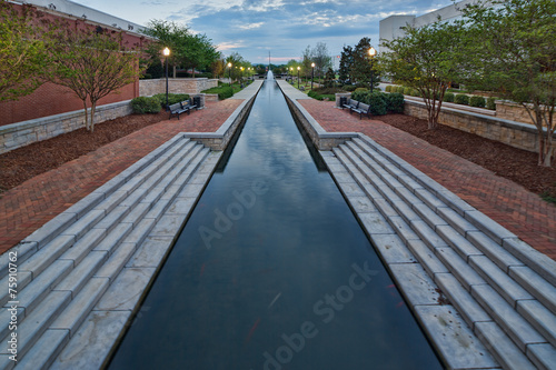 Evening time at a canal ending with a fountain, in Big Spring Park, Huntsville, Alabama