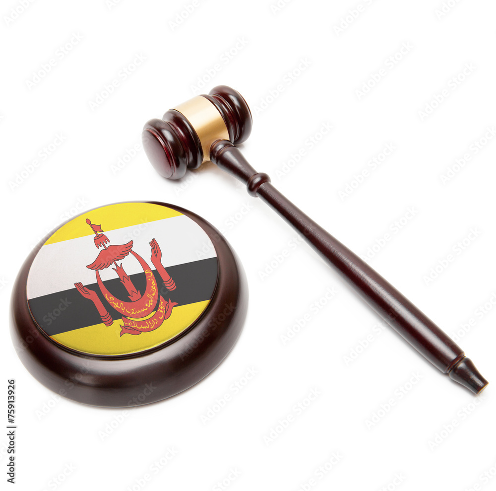 Judge gavel and soundboard with national flag on it - Brunei