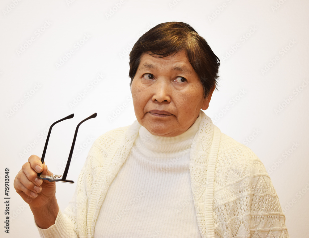 眼鏡を外す女性 Stock 写真 Adobe Stock 眼鏡を外す女性 Stock 写真 Adobe Stock