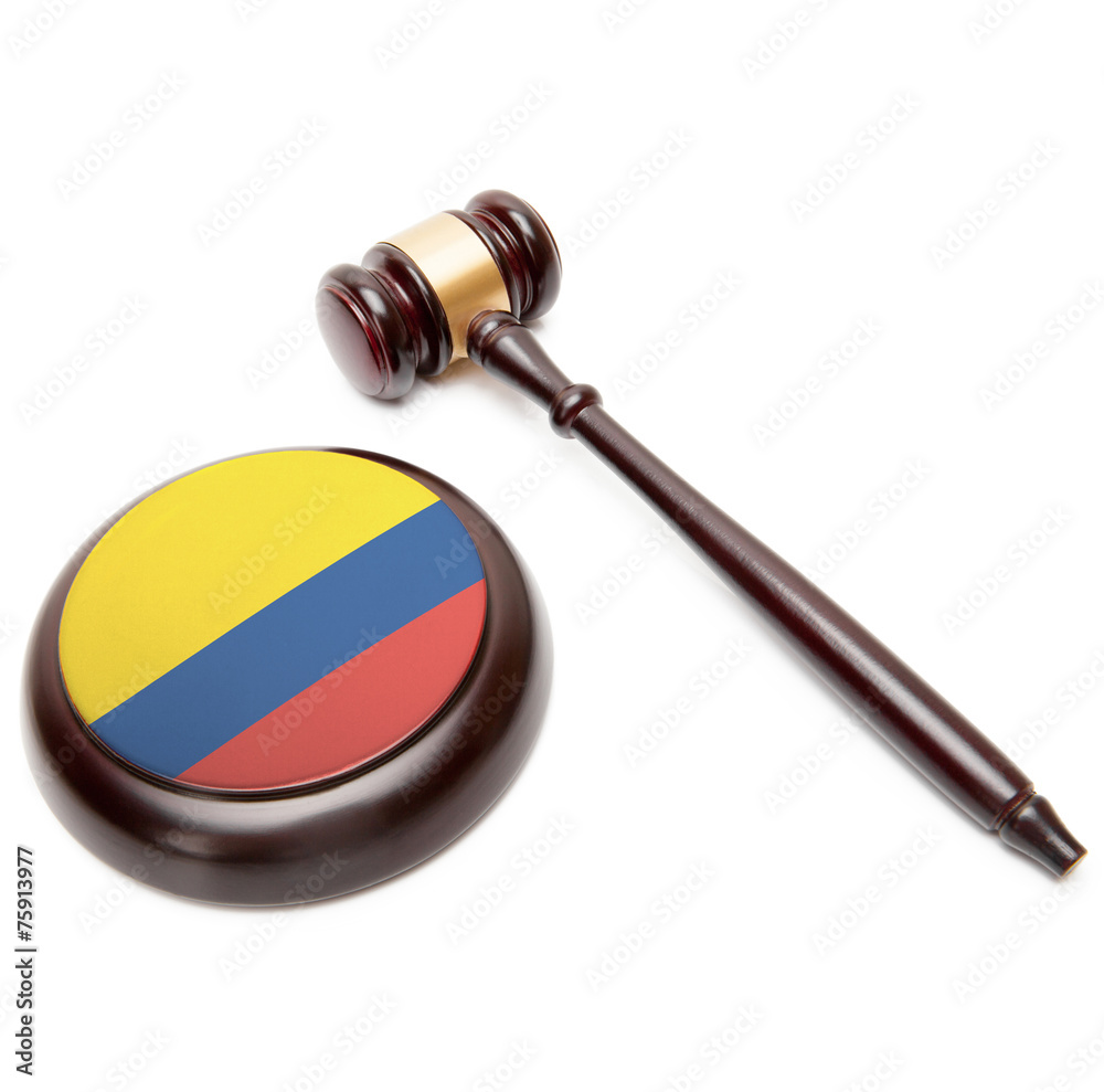 Judge gavel and soundboard with national flag on it - Colombia