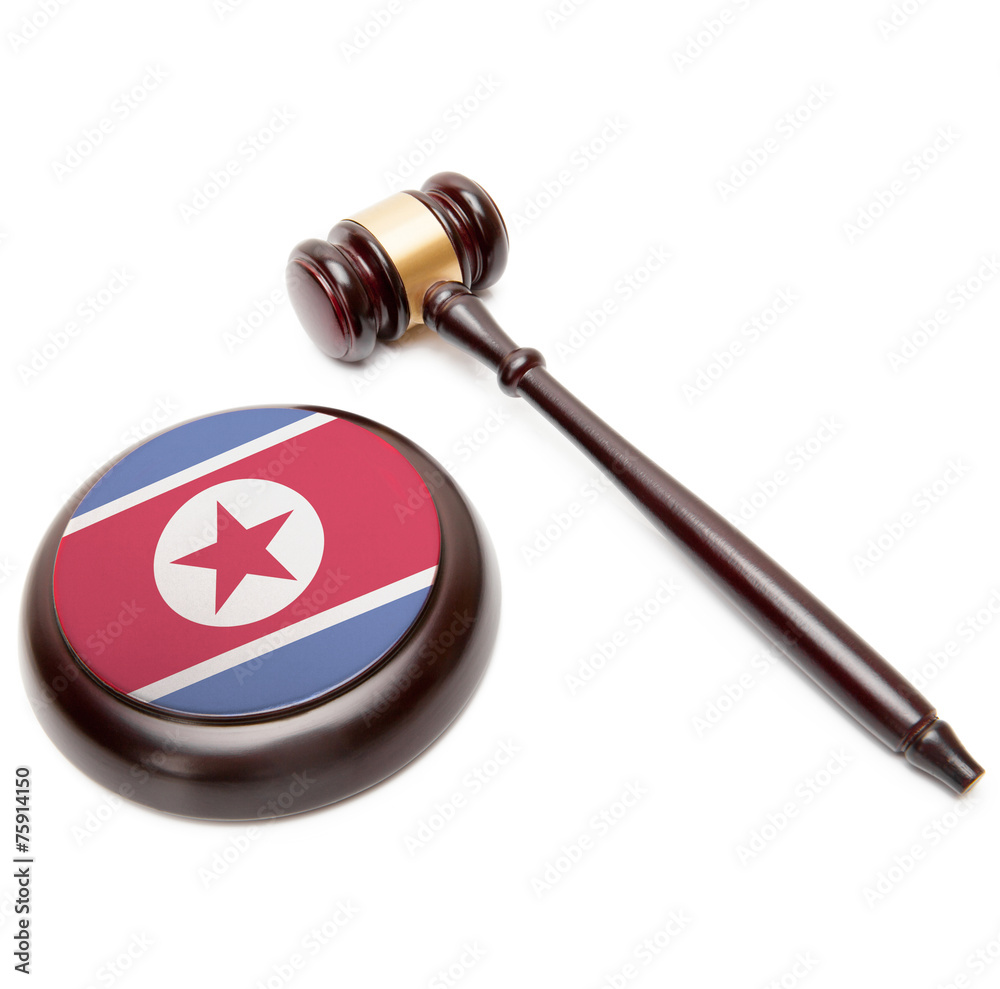 Judge gavel and soundboard with flag on it - North Korea