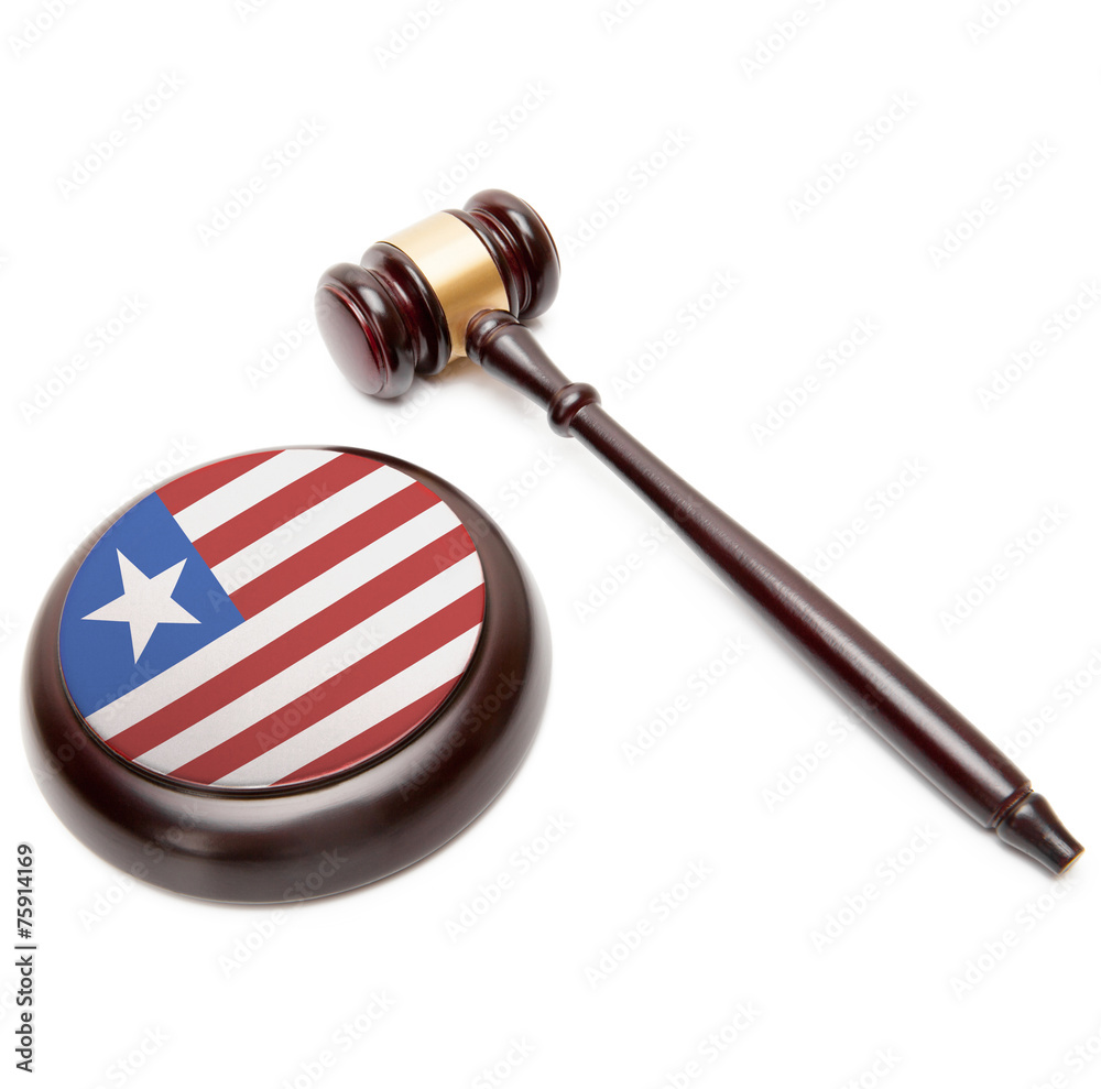 Judge gavel and soundboard with national flag on it - Liberia