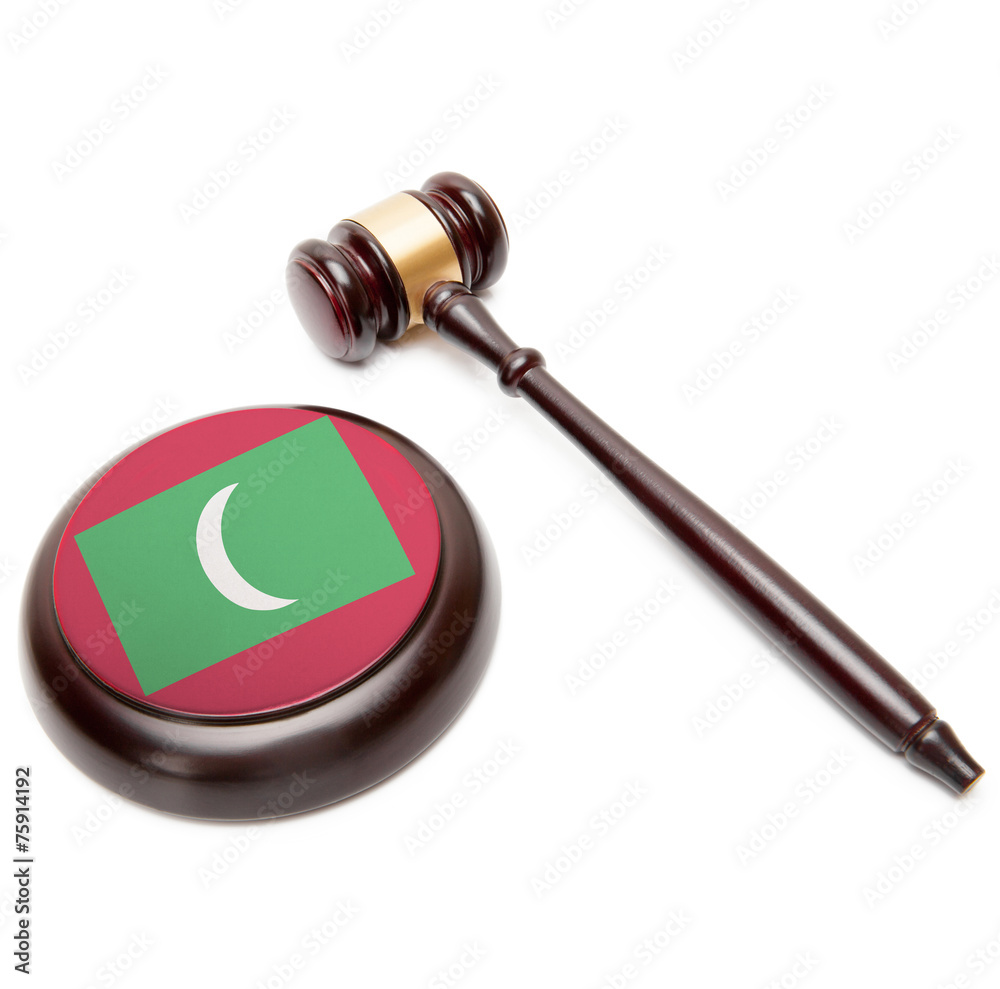 Judge gavel and soundboard with national flag on it - Maldives