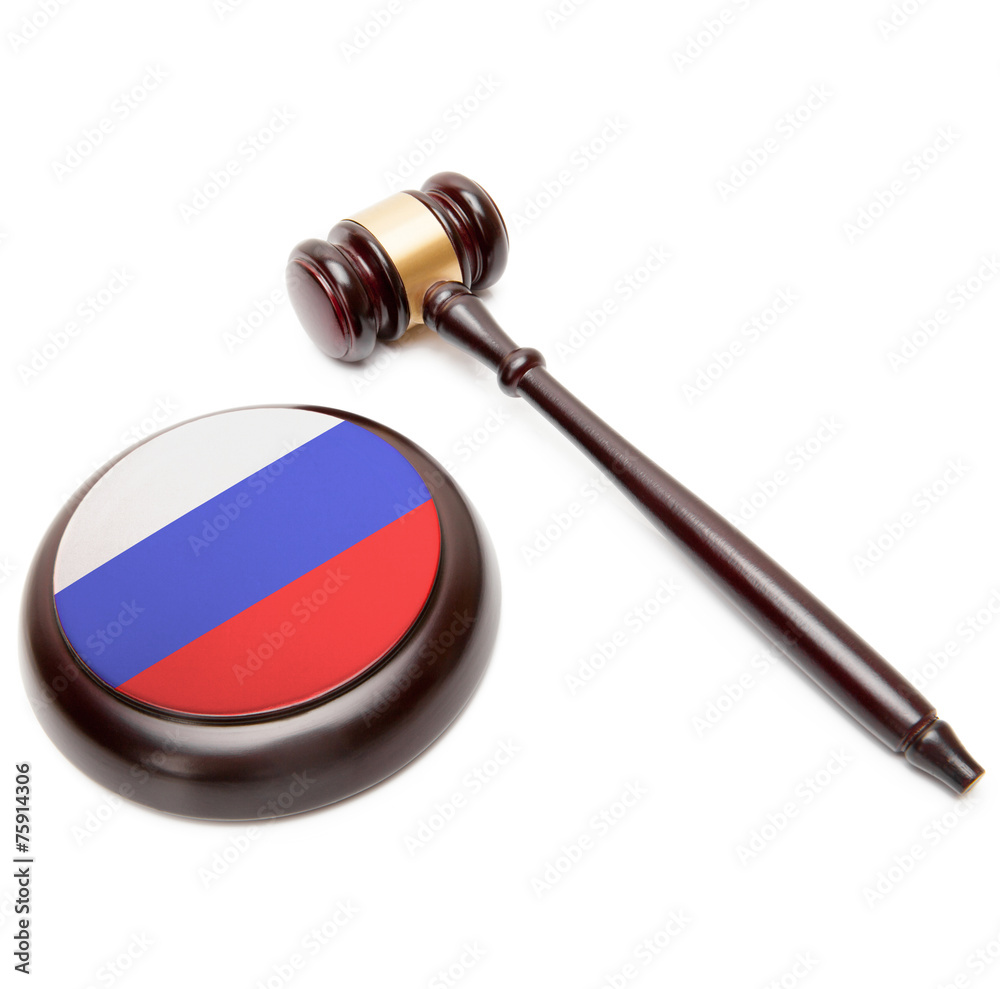 Judge gavel and soundboard with national flag on it - Russia