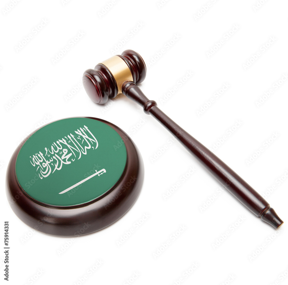 Judge gavel and soundboard with flag on it - Saudi Arabia