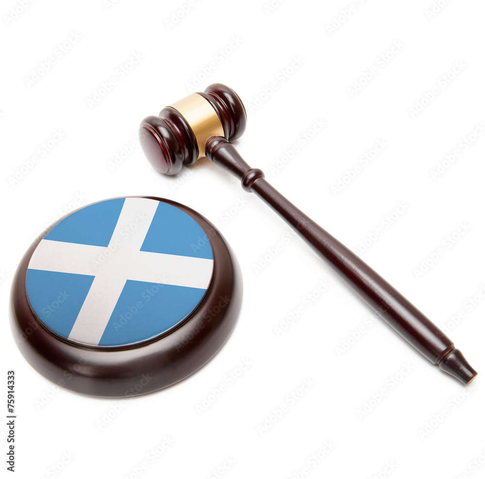 Judge gavel and soundboard with national flag on it - Scotland