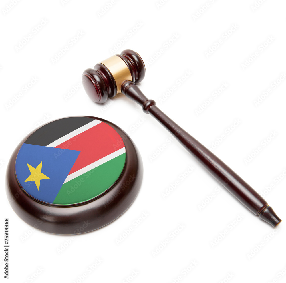 Judge gavel and soundboard with flag on it - South Sudan
