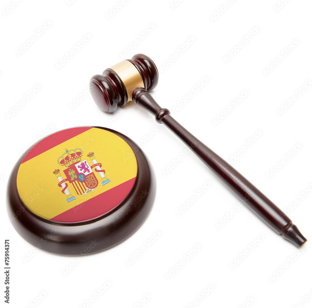 Judge gavel and soundboard with national flag on it - Spain