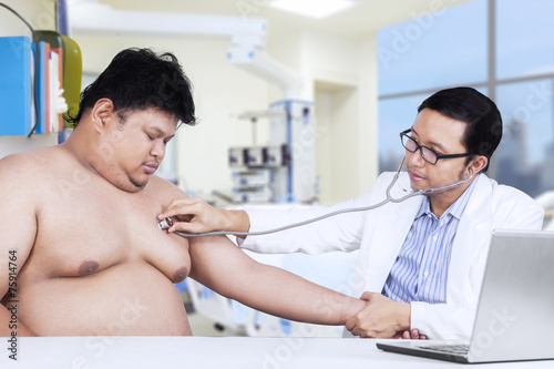 Obesity person visits doctor to checkup