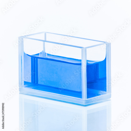 Cuvette with blue liquid photo