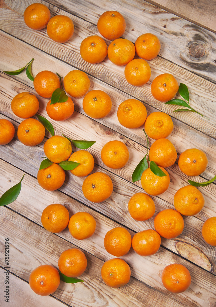 Tangerines on a wooden table