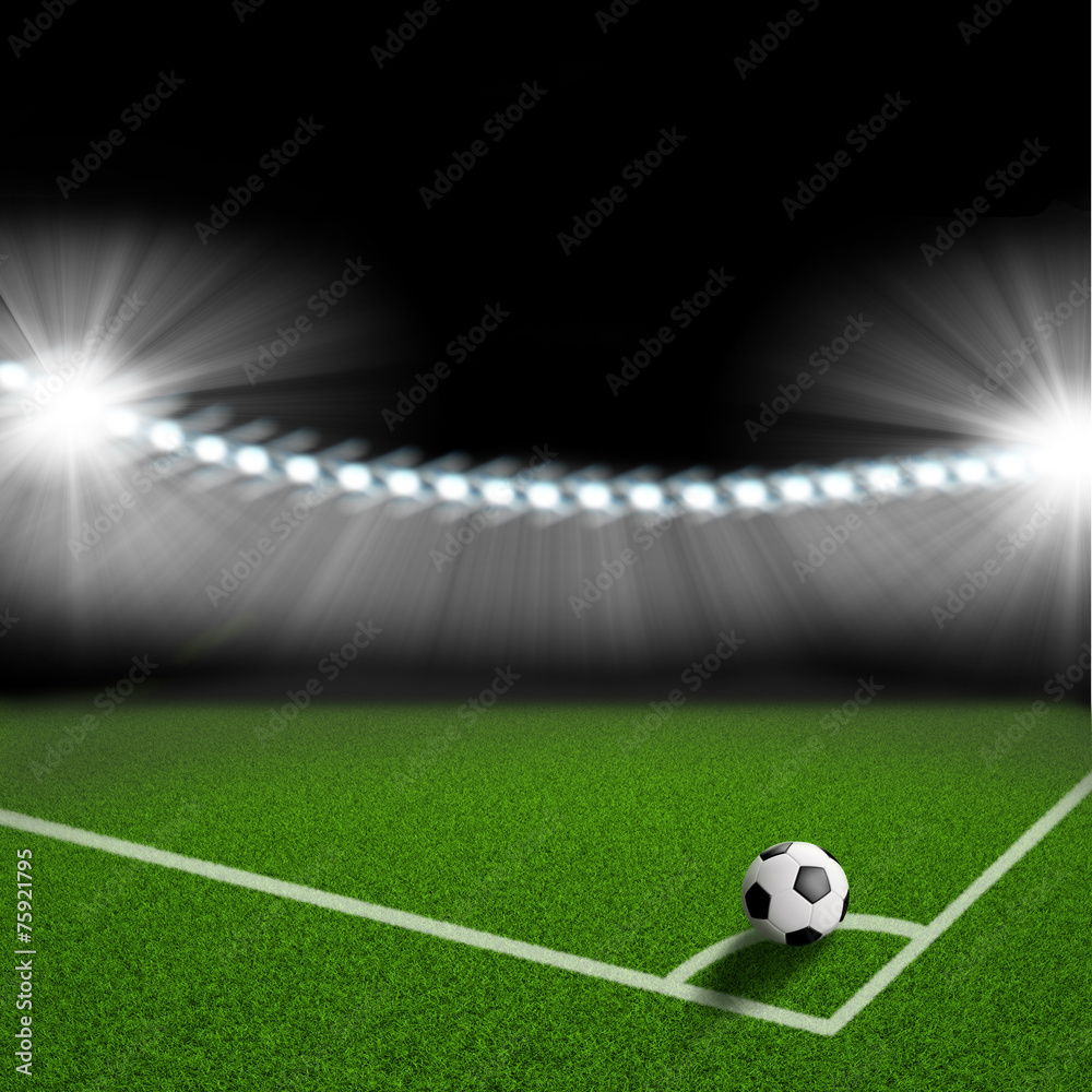 Obraz premium soccer ball on the green field corner