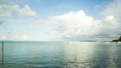 mauritian seaside with fisher boat photo
