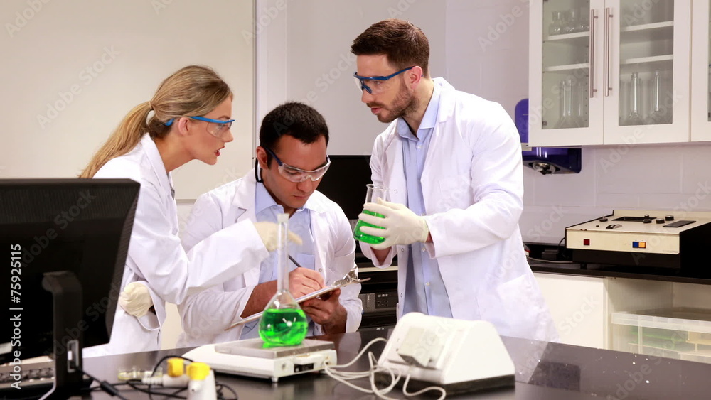 Young scientists working together in the lab Young scientists working together in the lab