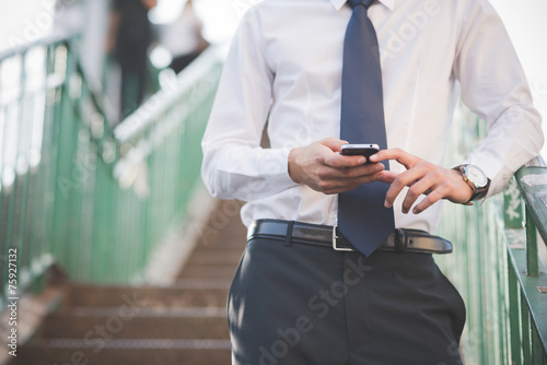 close up businessman man hands using smart phone