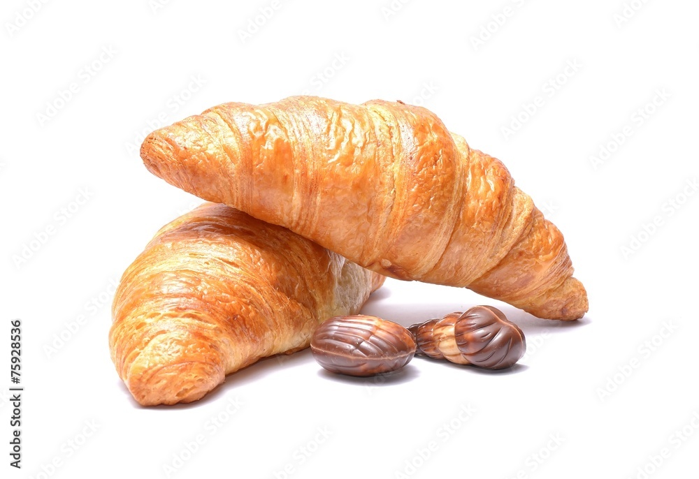 Chocolate croissant and candies isolated on white background