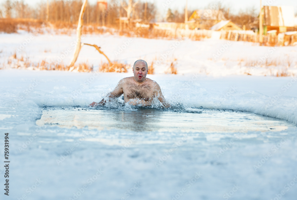 man swimming cold water