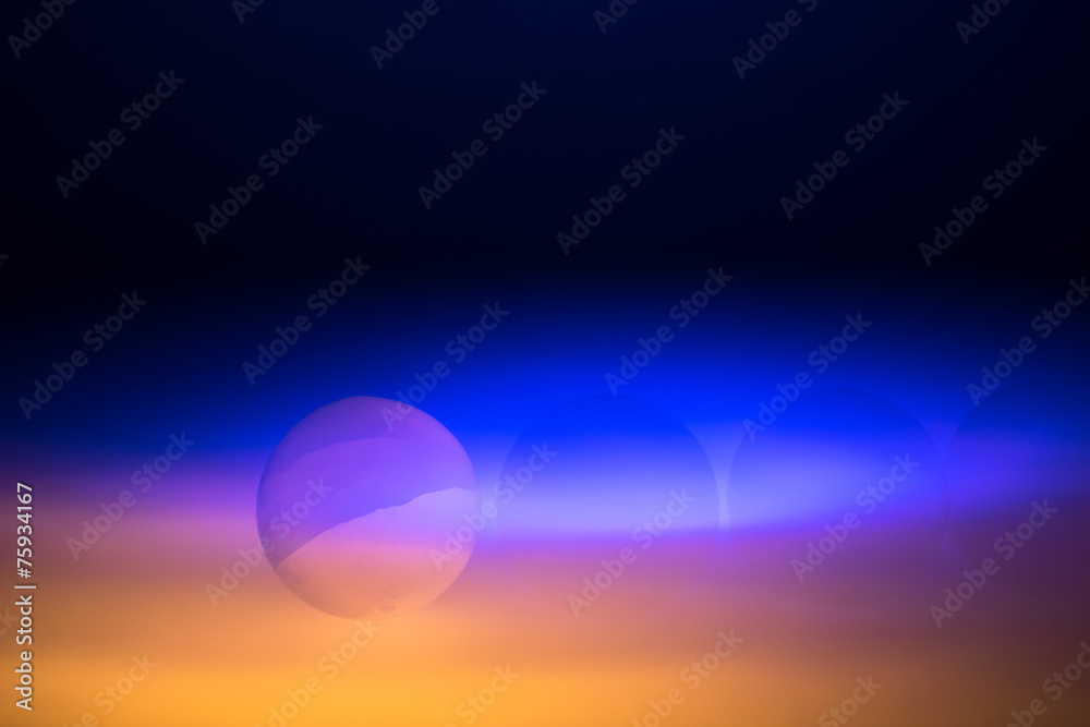 selenite ball in colored strobe light