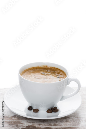 cup of espresso on a white table and space for text, vertical