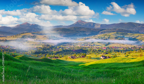 Colorful summer morning in the Carpathian mountain village