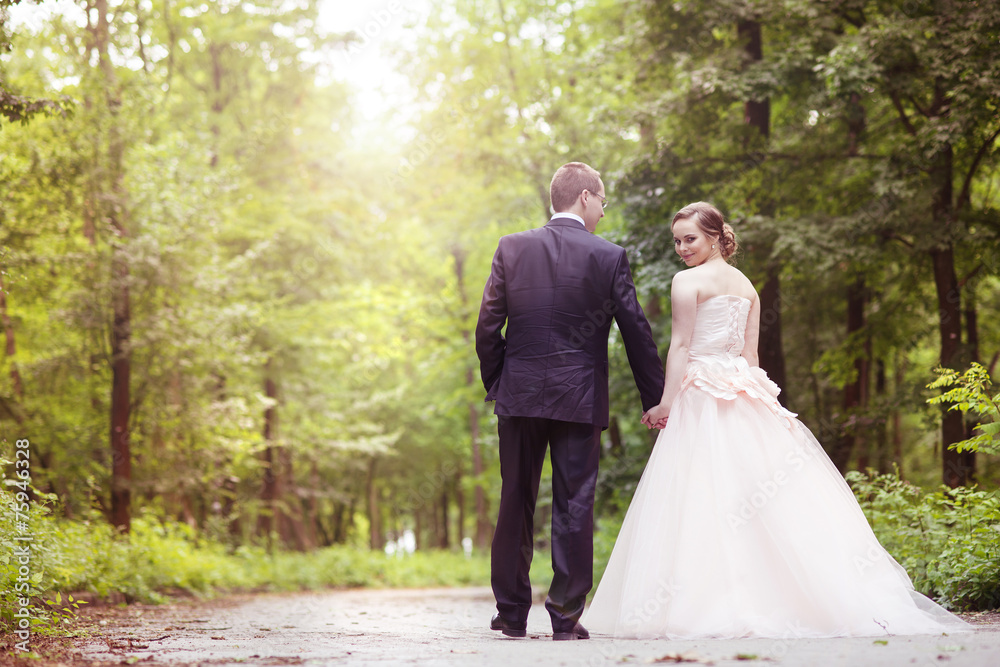 Wedding couple on a walk