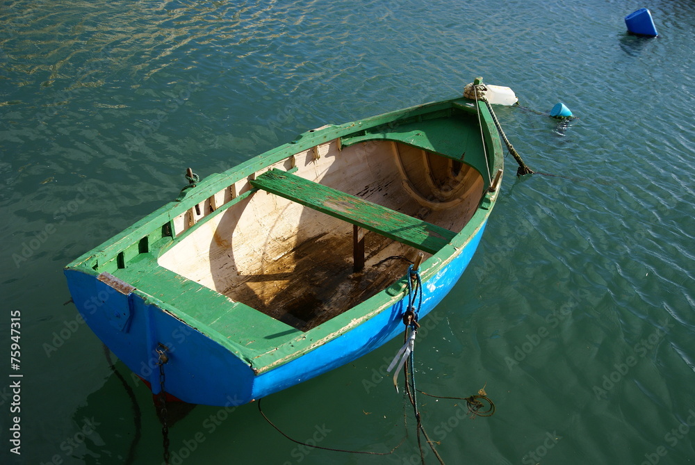 Empty fishing boat on the sea