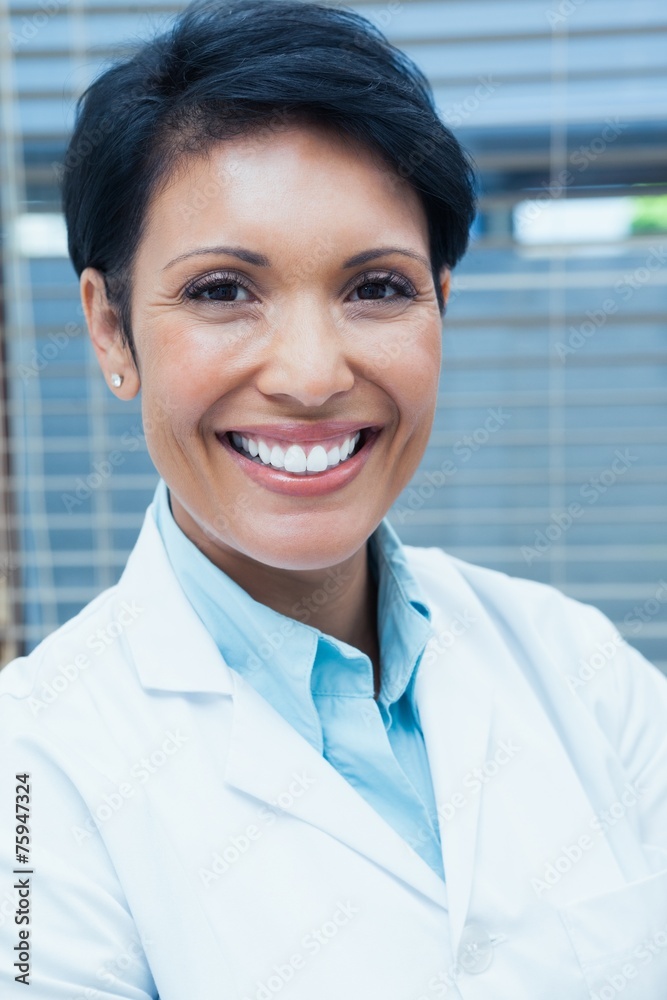 Portrait of smiling female dentist Portrait of smiling female dentist