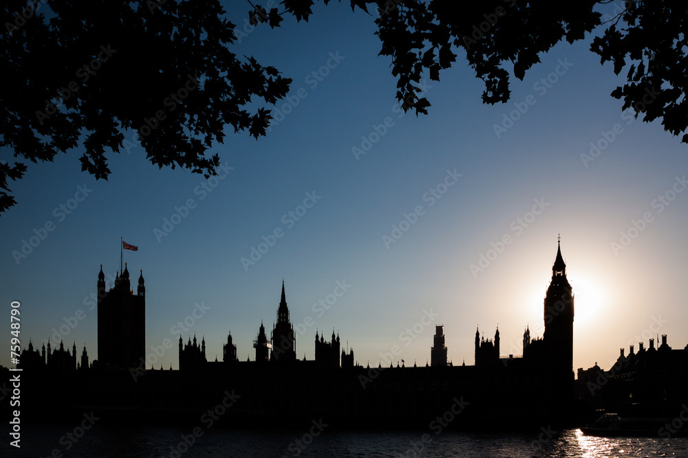 Houses of Parliament and Big Ben silhouette at sunset, London